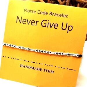 Morse Code bracelet ,silver beads spelling out the message "Never Give Up"